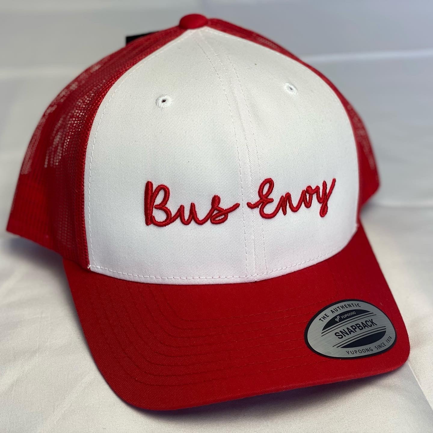 Snap Back Trucker Cap. Red/White. Red 3D logo.