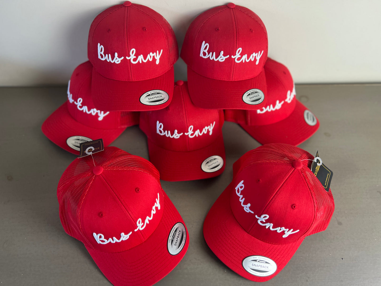 Snap Back Trucker Cap. Red / White. 3D logo.